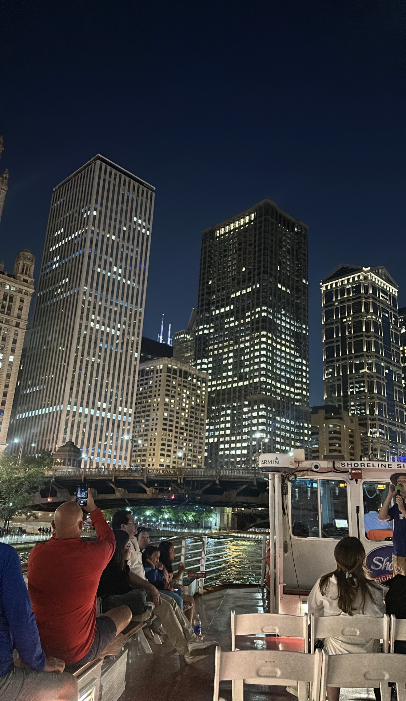 Chicago’s skyline from the water after dark.