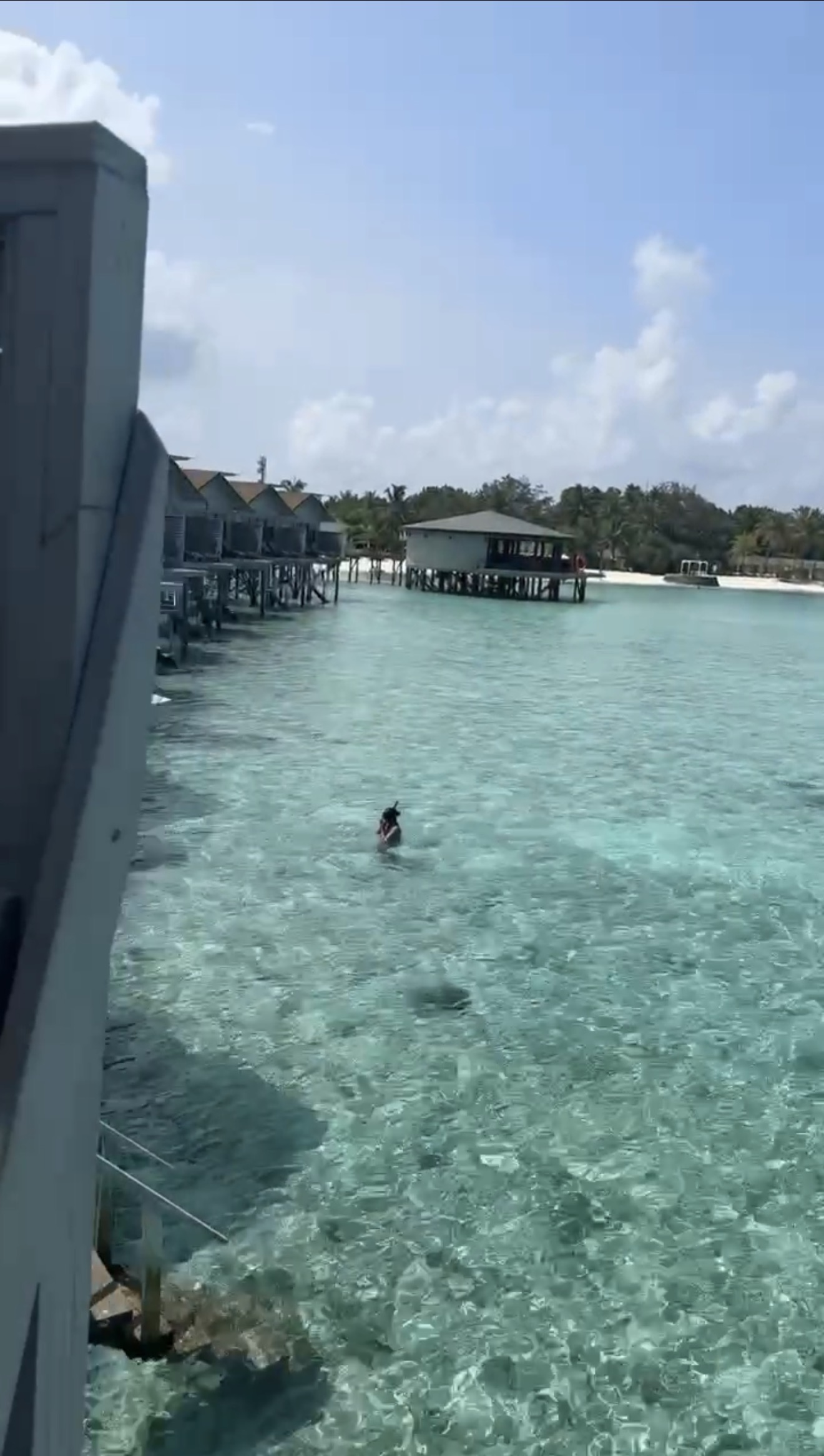 Clear water and overwater villas in the Maldives.